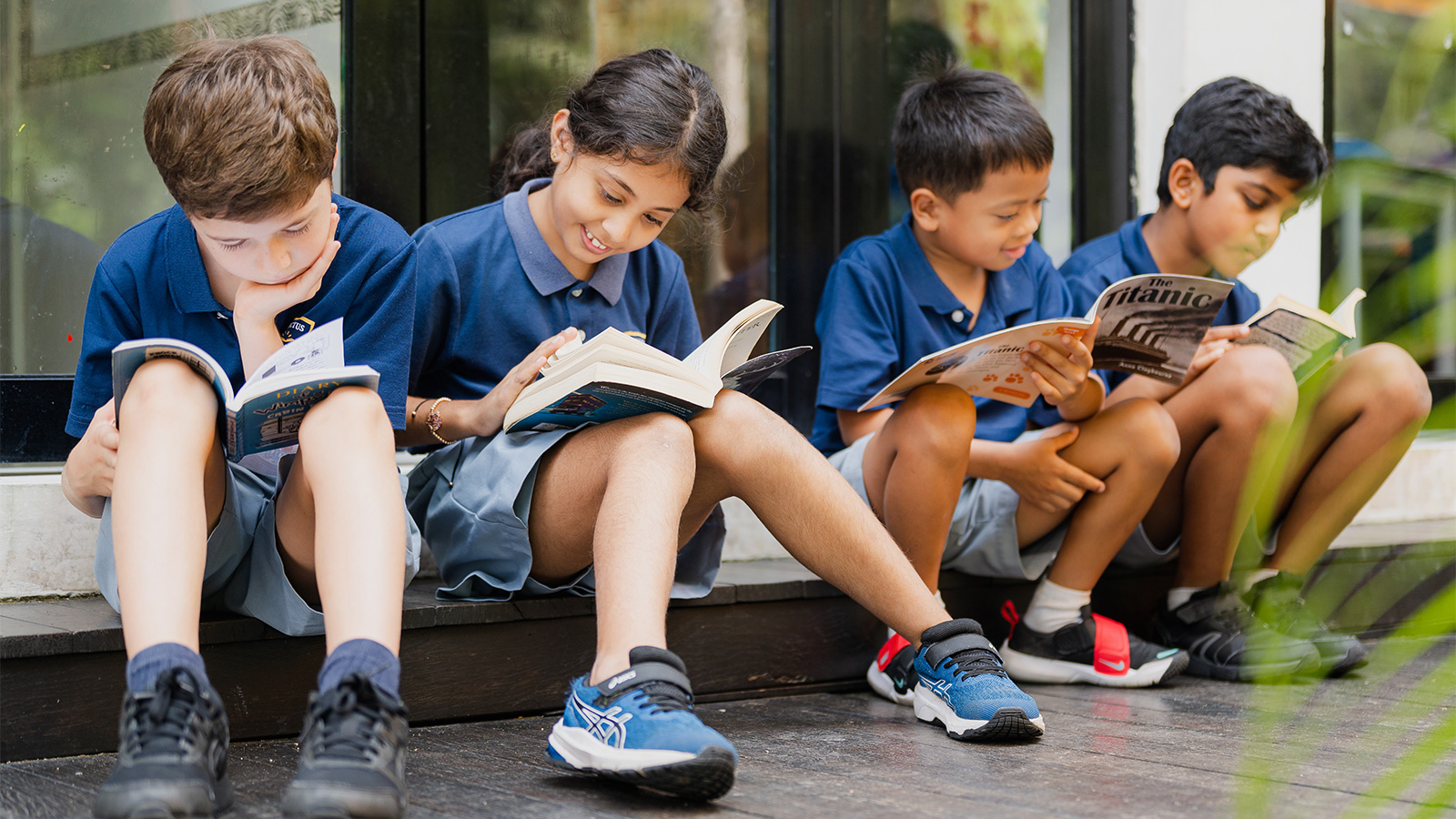 invictus_students_reading_outside_dempsey.jpg